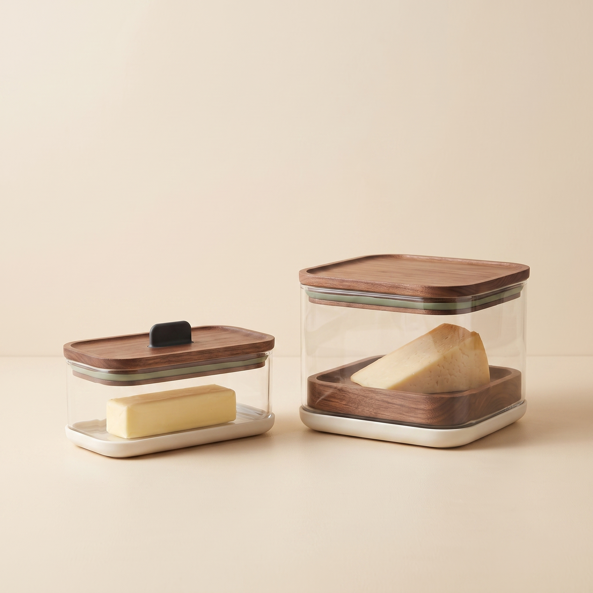 Coordinated clear cheese and butter storage keepers with warm wood accents