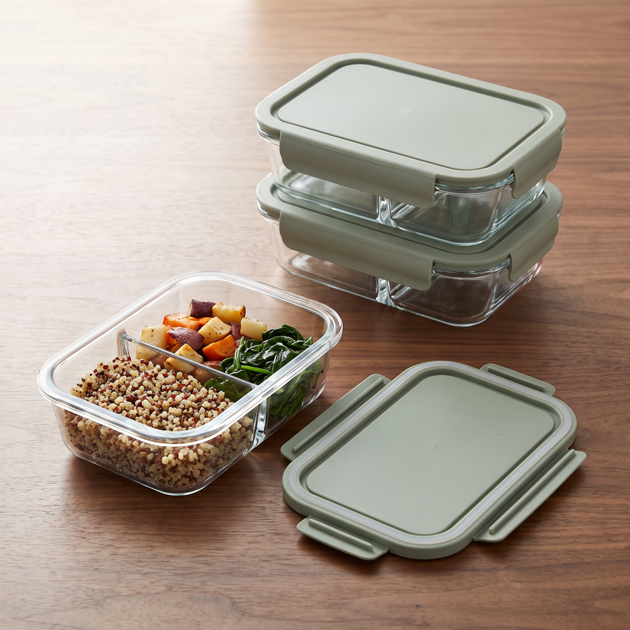 Divided glass meal prep containers with sage lids